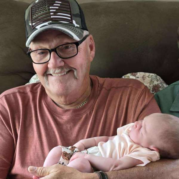 Photo of Dan with Great Grandchild
