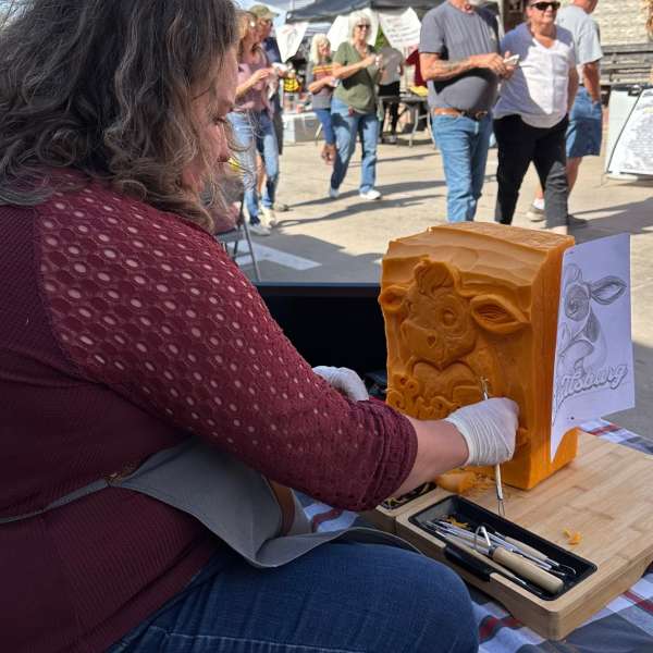 Photo of Vicki carving